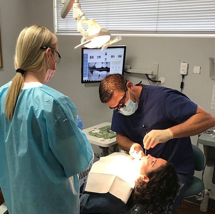 La Canada Flintridge Dentist, Dr. Albert working on patient